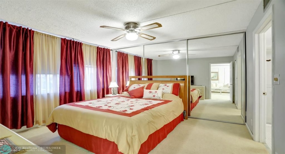 With more storage behind mirrors, as well as a walk-in closet.