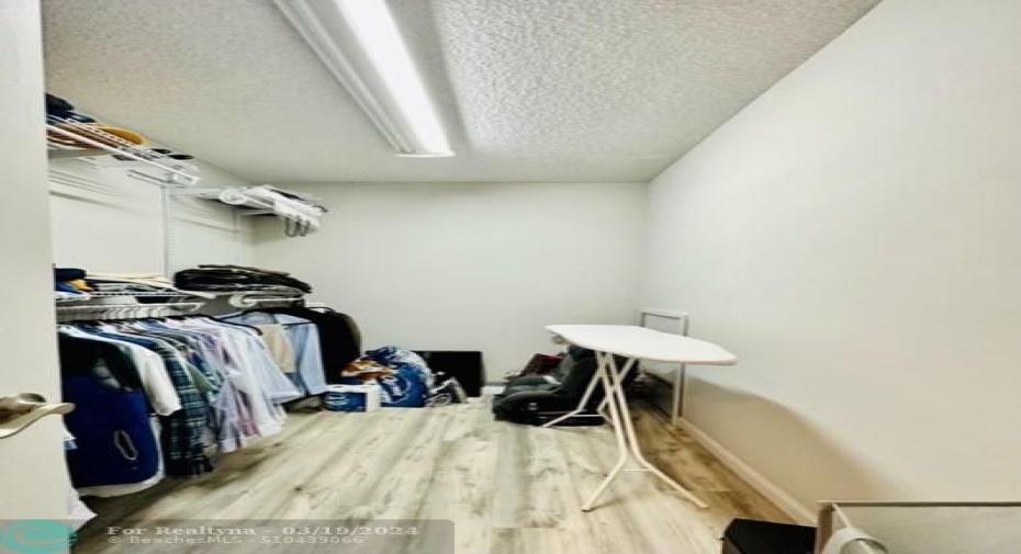 walk-in closet in master bedroom