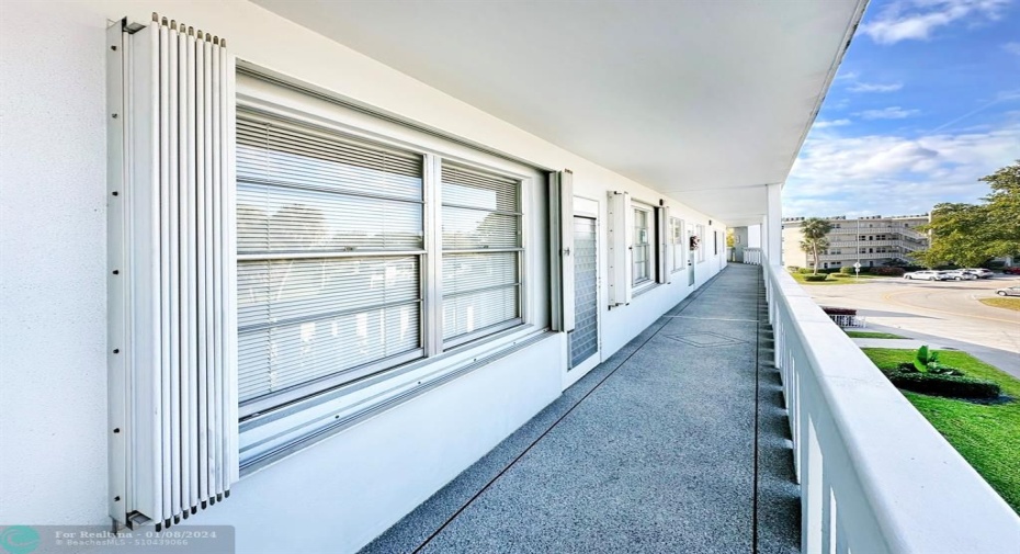 Accordion Shutters in front of Condo