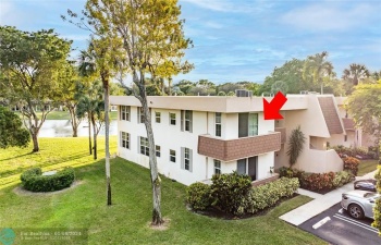 Coveted 2nd floor waterfront garden residence