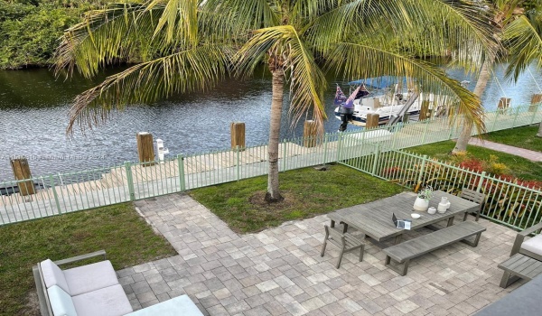 View of the back patio and private dock space on the Dania Cut-Off Canal.