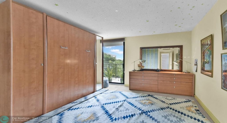 2nd Bedroom with Murphy Bed Closed.  Included in Sale