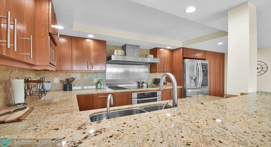 Open Kitchen with Granite Countertops