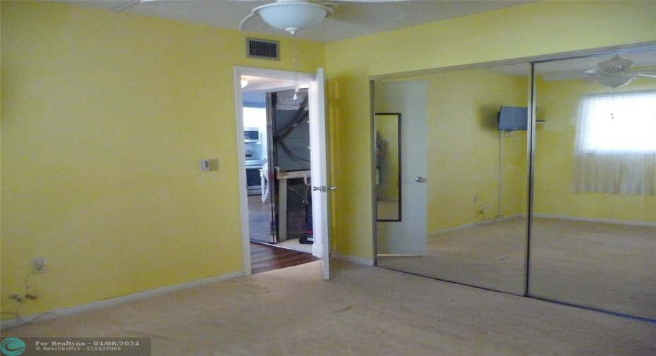 SECOND BEDROOM;MIRRORED SLIDING CLOSET DOORS