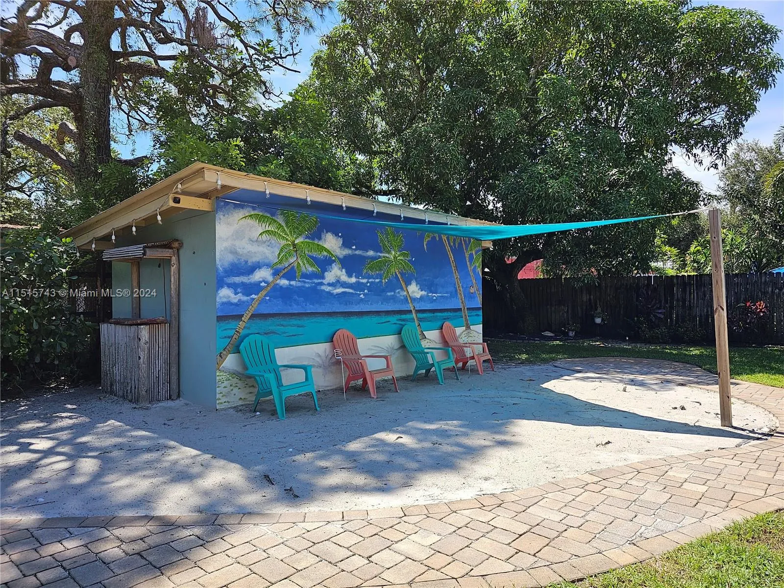 beach area in front of shed/outbuilding