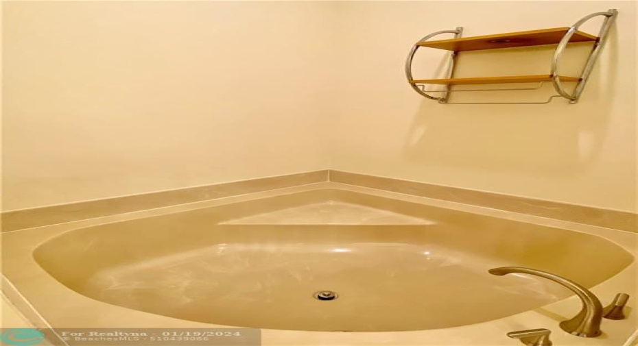 Primary bathroom Roman tub.