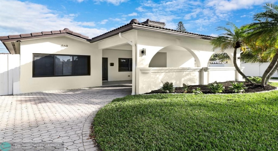 Carport with circular drive