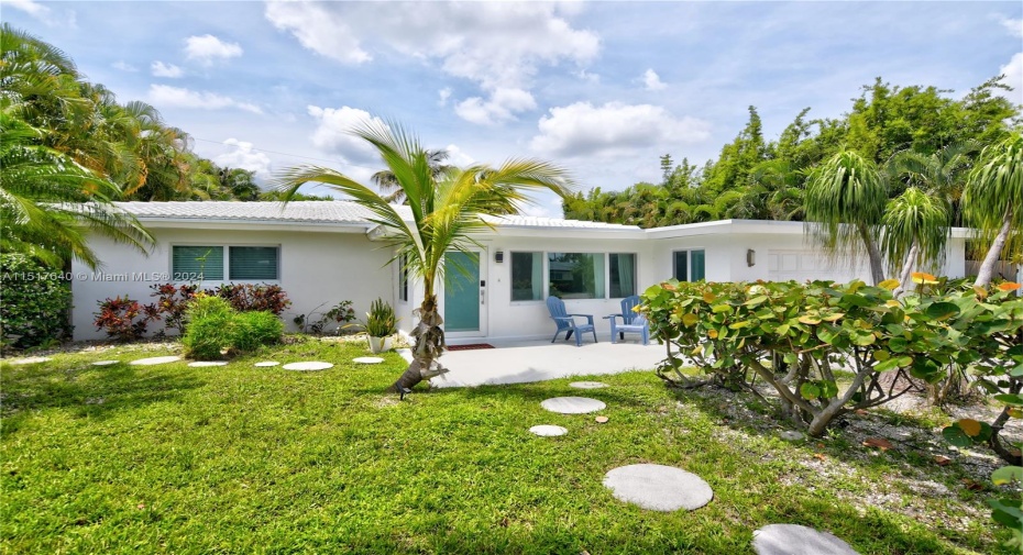 One story tastefully remodeled Mid Century home with large pool.
