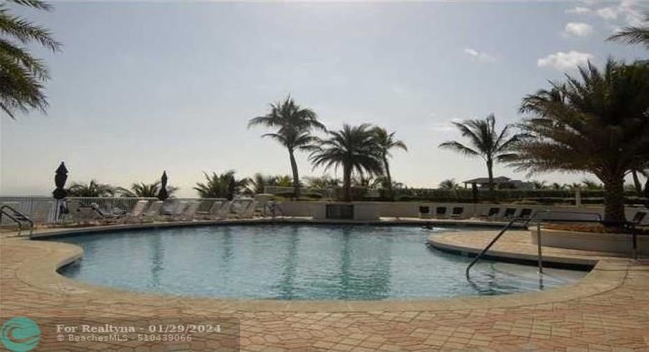 Community pool with direct access to the beach