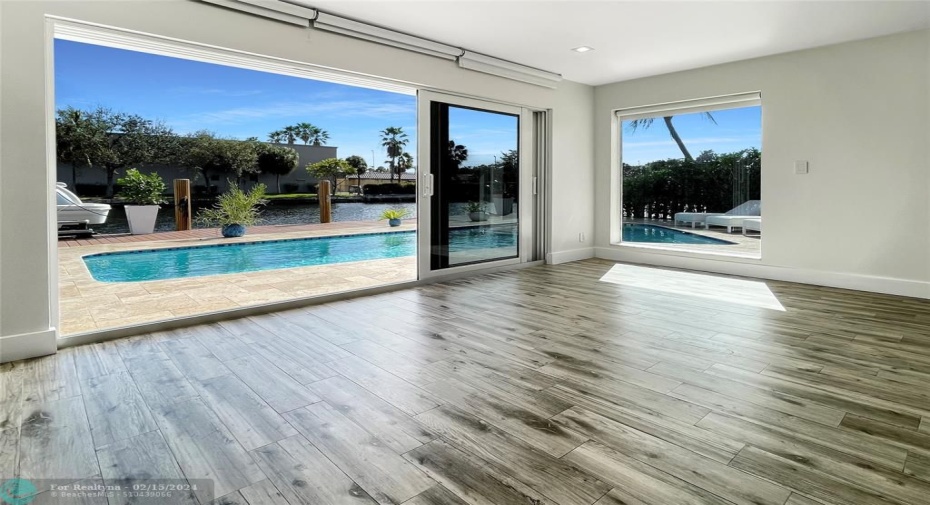 Sliding wall of glass to the pool deck