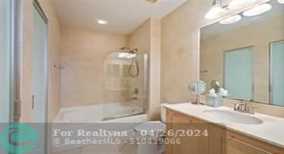 Beautiful Master Bathroom with huge Linen closet and designer doors!