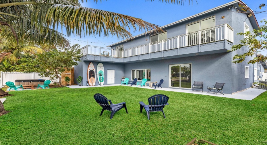 Outdoor balcony spans from one bedroom to the next making for easy entertaining.