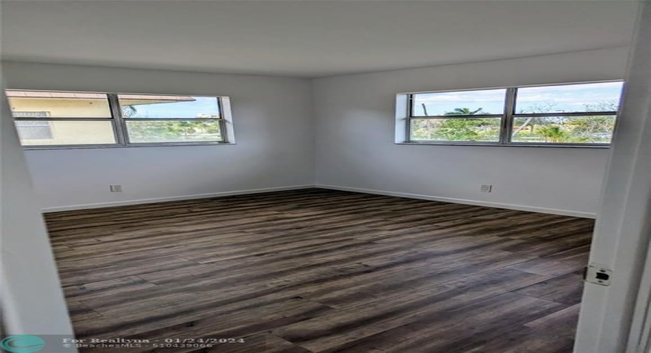 Primary bedroom suite with bath and standing shower