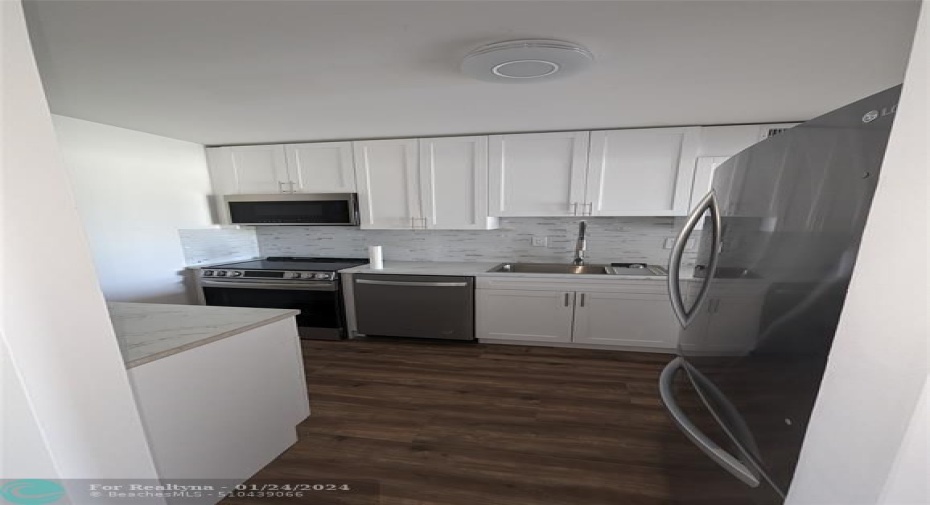 Brand new solid wood cabinets, top of the line brand new appliances, new backsplash new micro and oven and dishwasher refrig disposal
