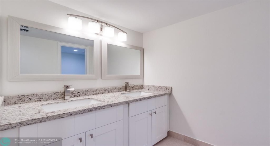 Separate Upgraded Double sinks/vanity with granite counter tops & plenty of storage