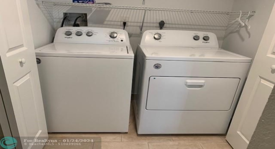 Laundry is located just across from the Kitchen it has newer washer and dryer and plenty of storage