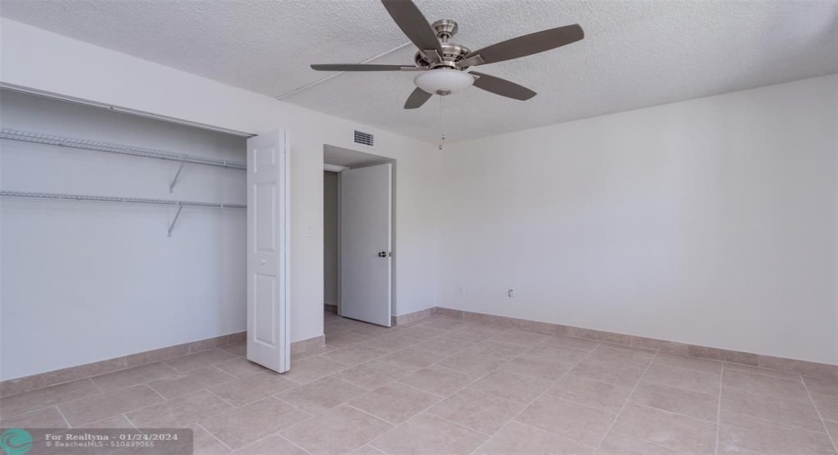2nd Bedroom with double closet and access to both the 2nd Bathroom and Laundry area.