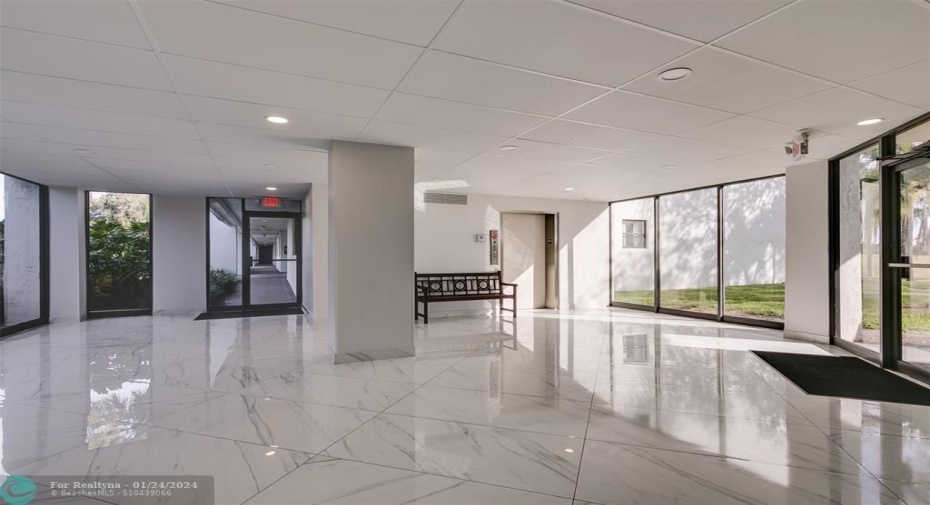 Recently updated lobby entrance to Elevator, Mailboxes & Stairway