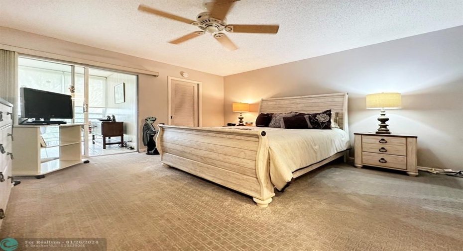 Spacious Primary Bedroom has Entrance to Patio