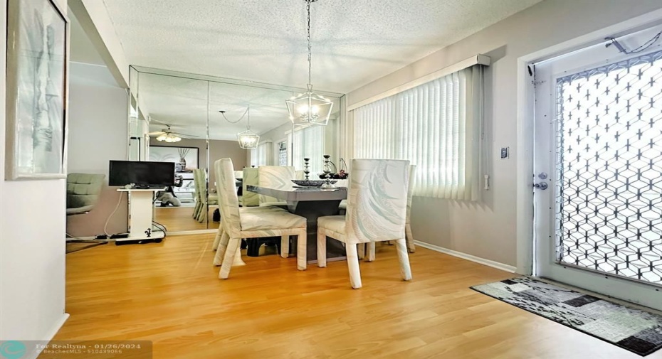 Mirrored Wall in Furnished Dining Area