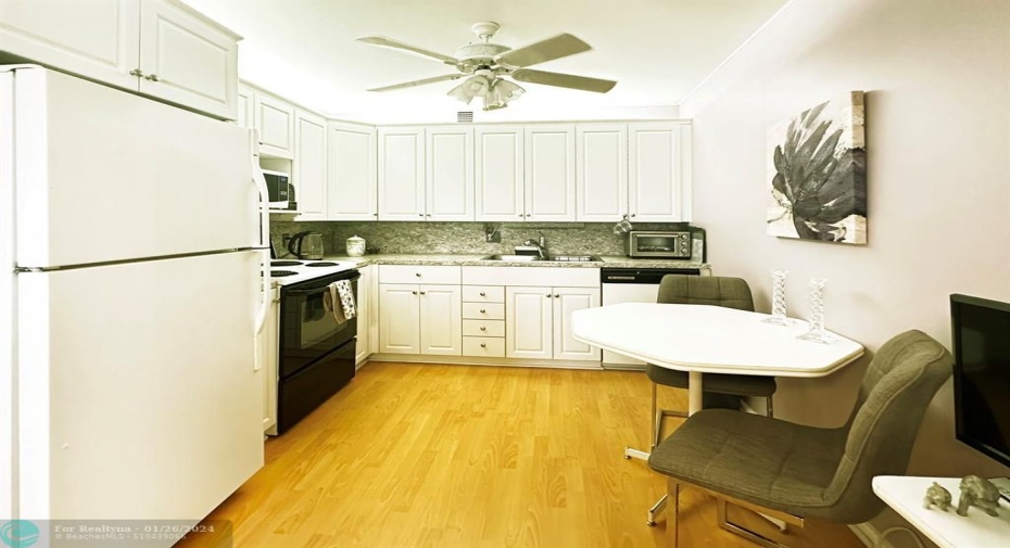 Kitchen has been Updated w/White Cabinets