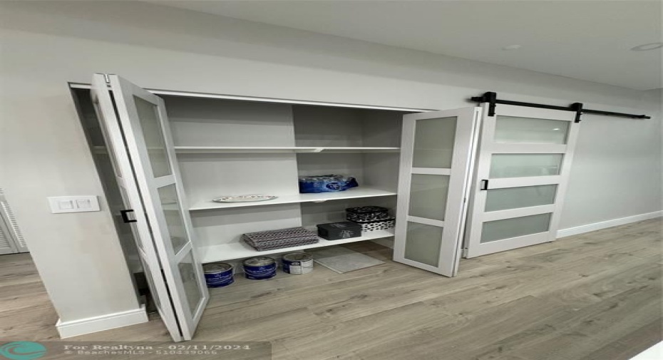 Extra storage area behind Custom Glass Doors