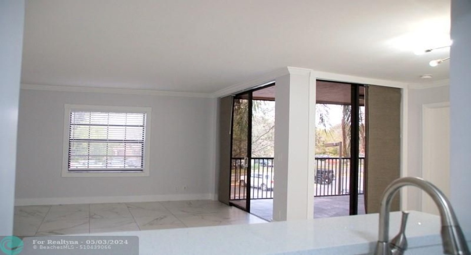 Living Room/ Dining Room open to screened patio