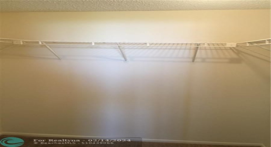 primary bedroom walk in closet