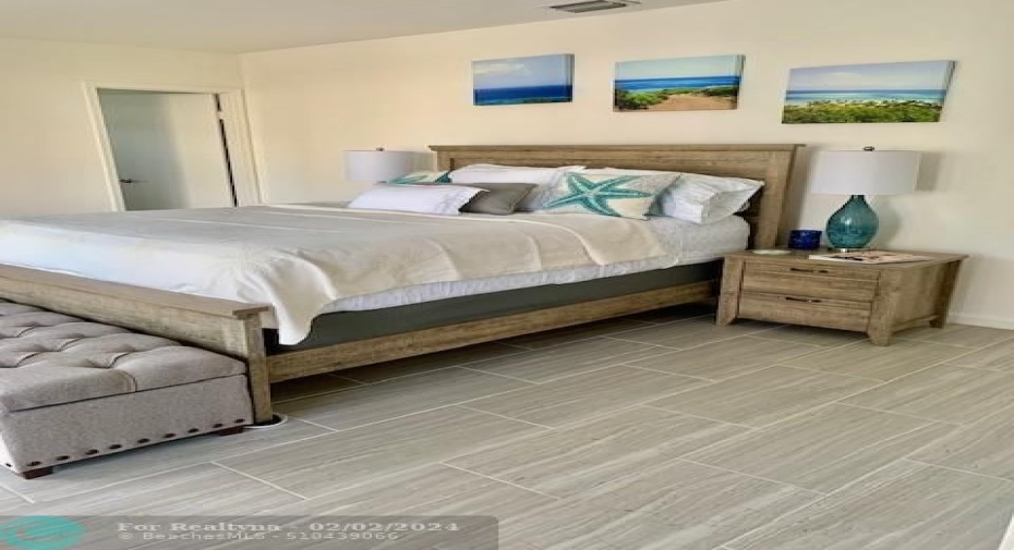 large master with walk-in closet and marble bathroom