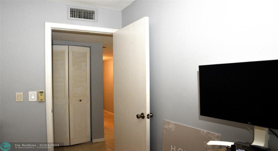 Utility closet in small hall