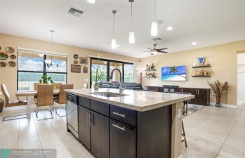 Kitchen island, dining area and living area