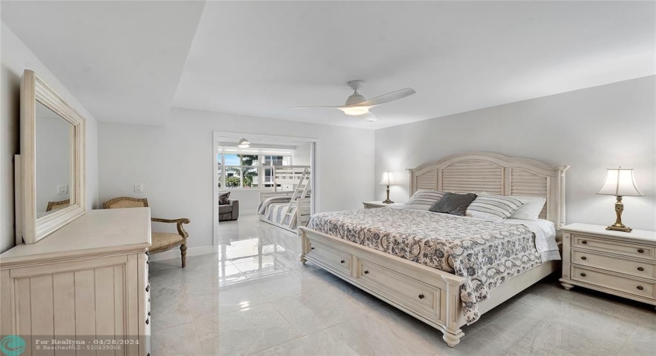 Primary Bedroom with additional room that can be closed off with opaque glass sliders