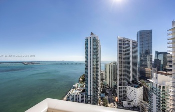 Stunning Bay Views & City Skyline Sunsets with this wrap-around balcony!