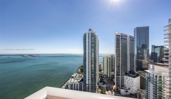 Stunning Bay Views & City Skyline Sunsets with this wrap-around balcony!