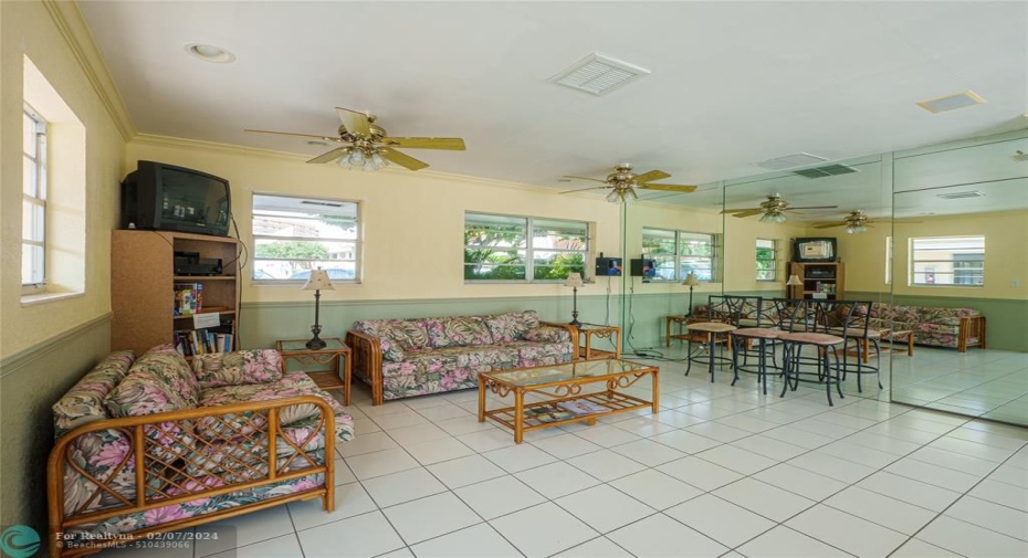 sitting area inside club house off of the pool