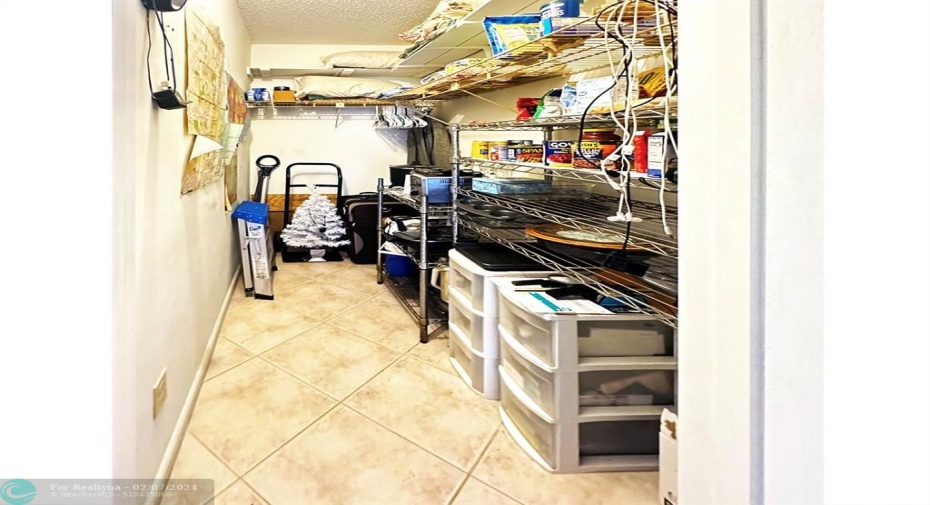 Spacious Walk in Closet has Lots of Storage Space