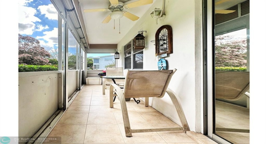 1st Floor Screened Patio Can Be Accessed from Both Bedrooms