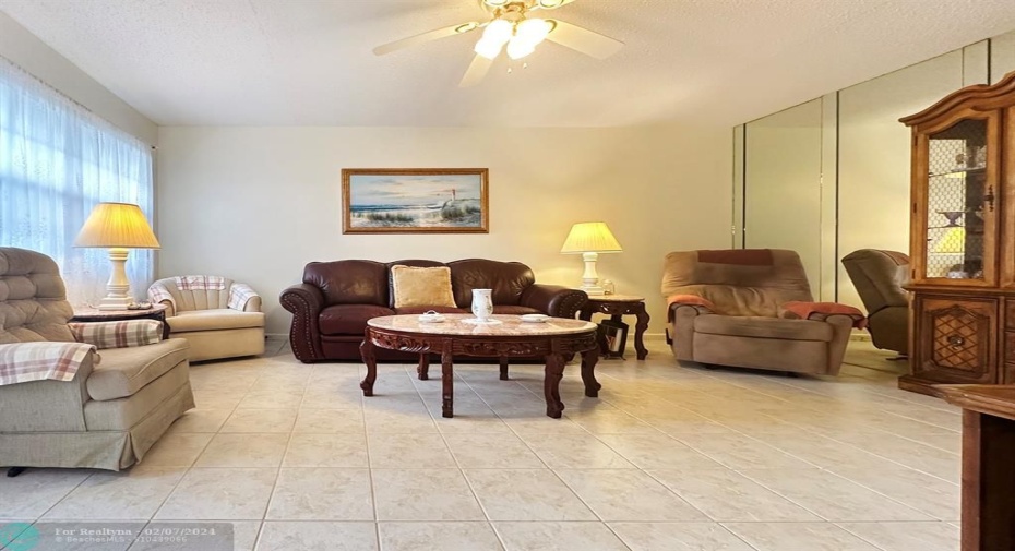 Bright Corner Unit w/ a Spacious Living Area.