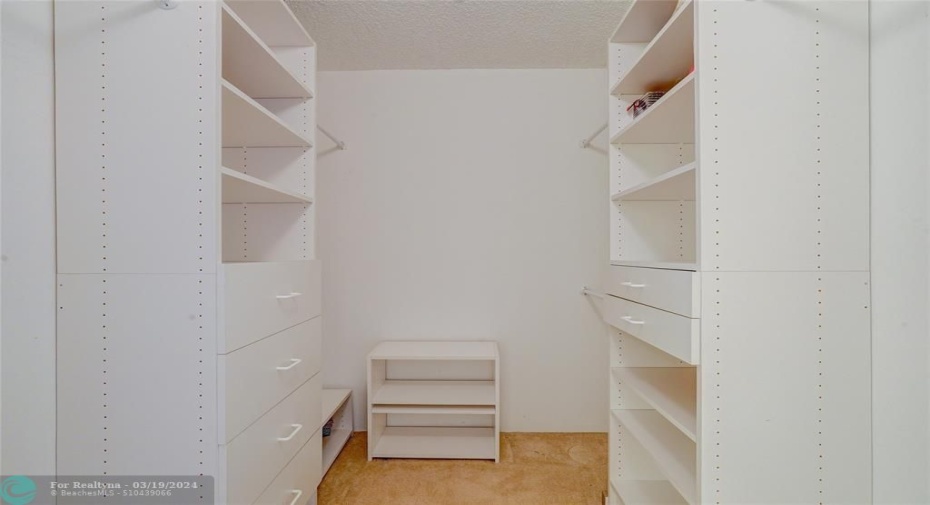 Two (2) white Walk-in Closets