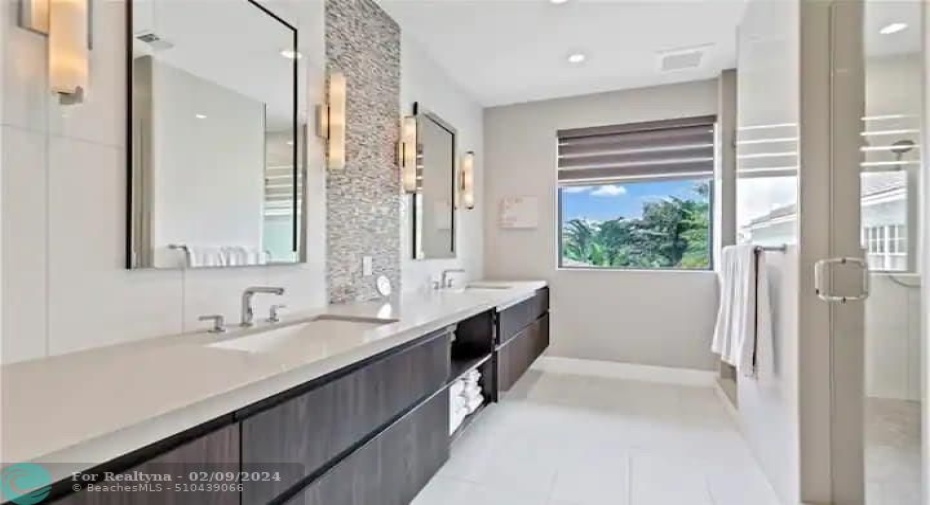 En Suite Primary Bathroom #1 with Double Sink & Shower.