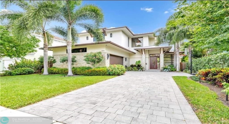 Front of HoFully appointed Luxury Vacation Home with Heated Pool in upscale Downtown Neighborhood walking distance to restaurants, pubs, shops & nightlife on Las Olas Blvd.e