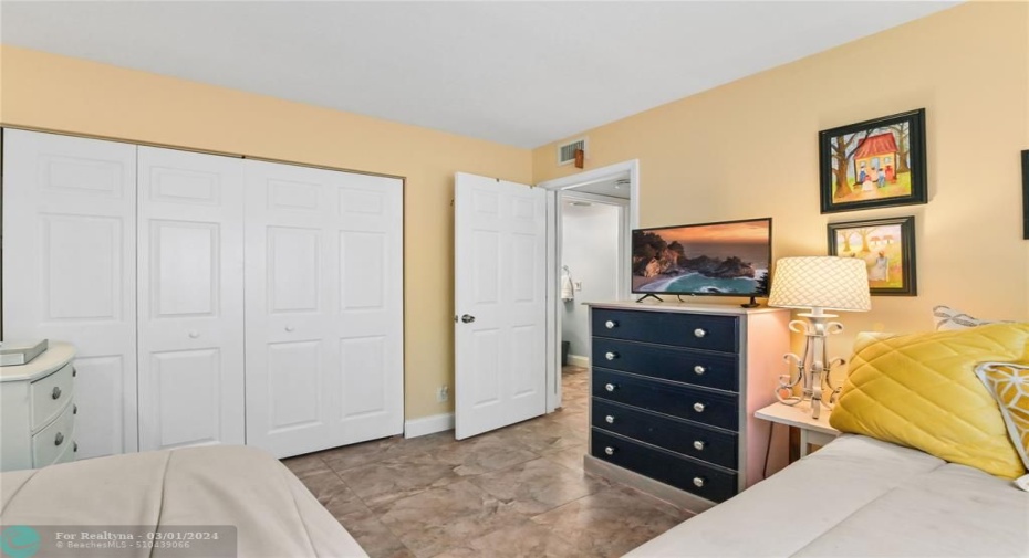 Guest bedroom with ample closet space