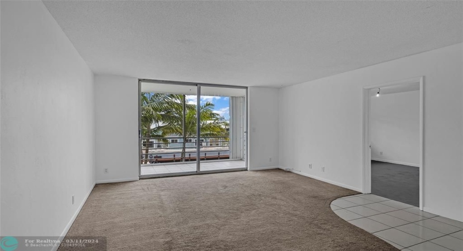 Great natural light and sliders to patio offered in living room