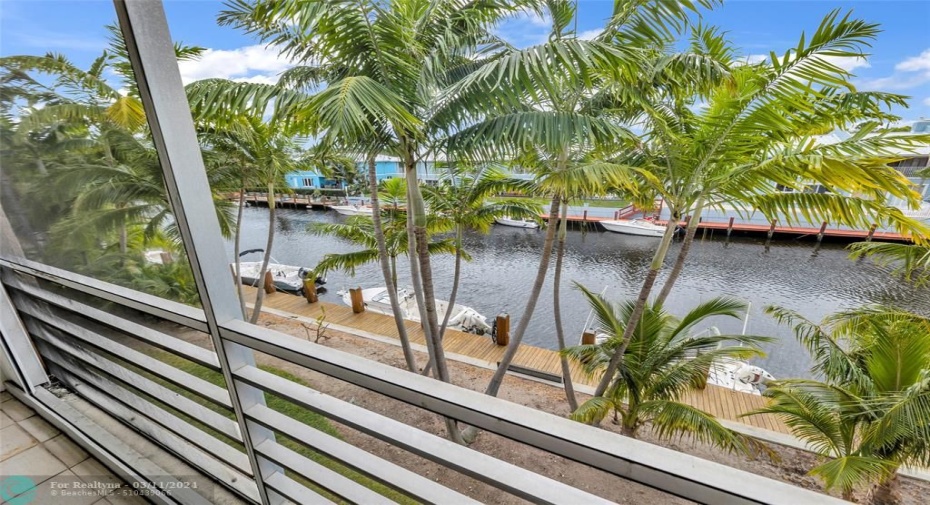 Direct water views from spacious screened patio