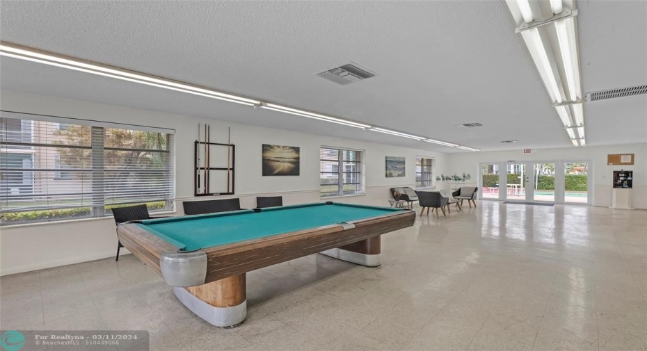 Large and spacious community room and clubhouse offering pool table and space to entertain