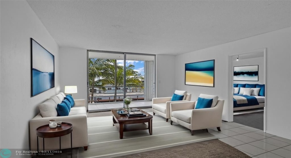 Living room is open and spacious with water views - Virtually Staged living room