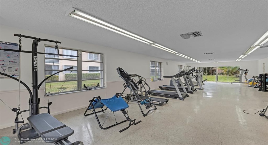 Large and spacious fitness center for convenient work outs right in your community and saving on gym membership