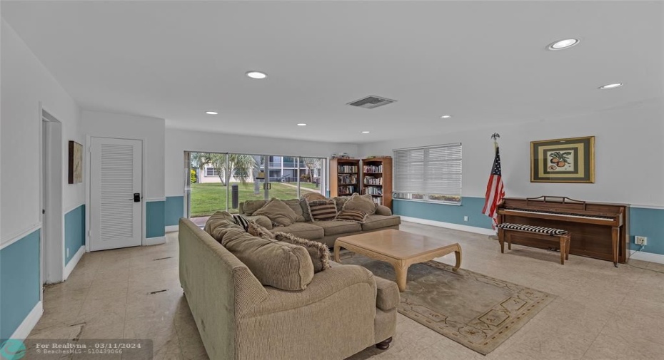 Community clubhouse offers piano, library, couches for lounging and more