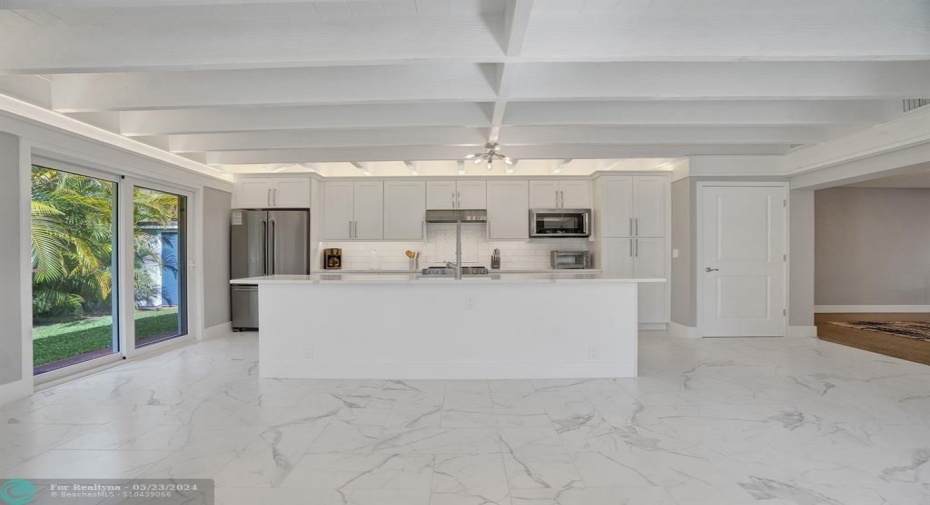 Kitchen with SGD to backyard