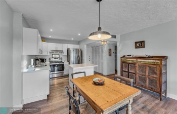 Open kitchen and living room plan perfect for entertaining.